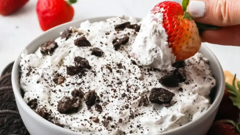 A creamy and inviting bowl of Oreo Dip garnished with crushed Oreo cookies, ready to be served.